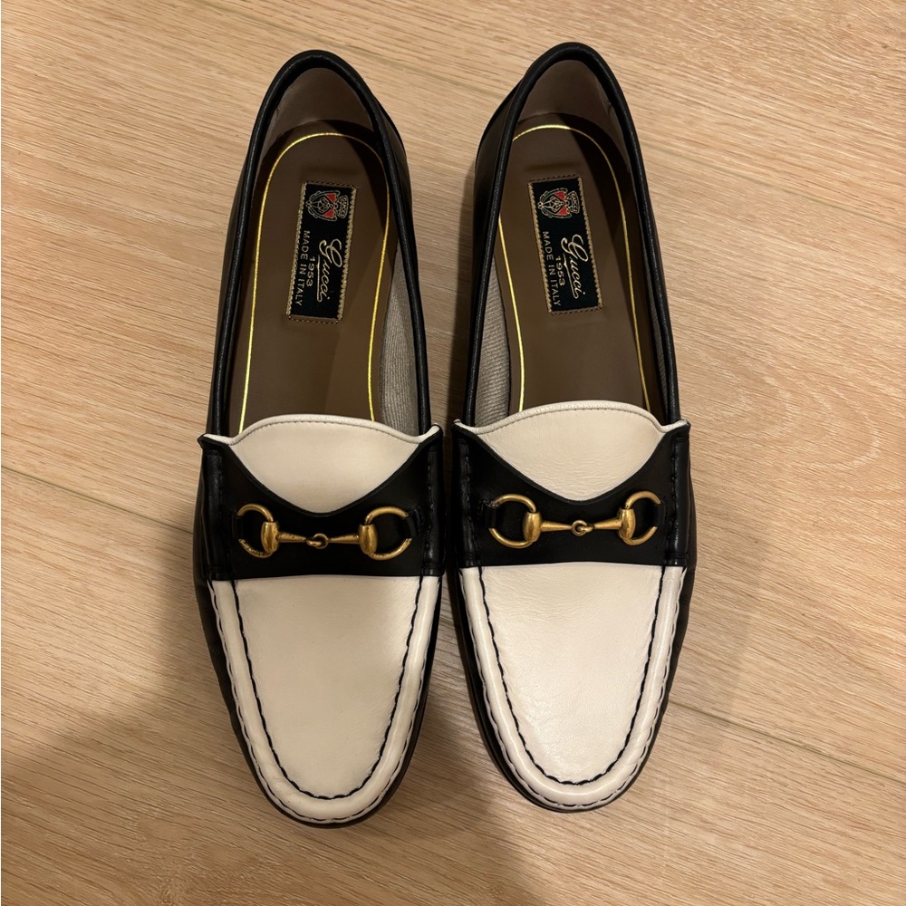 Gucci Two-Tone Leather Loafers with Gold Detail